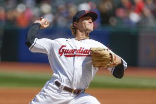 Cleveland Guardians starting pitcher Zach Plesac delivers against the Seattle Mariners.