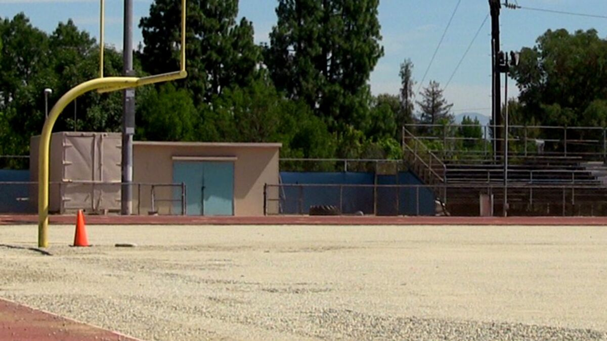 El Camino Real High is replacing its all-weather football field after issues involving pellets melting. It's one of five LAUSD high school fields being replaced.