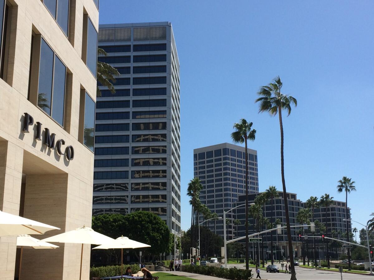 Departed Pimco "bond king" Bill Gross is setting up his office for rival Janus Capital in the Newport Beach high-rise shown at the rear of the photo.
