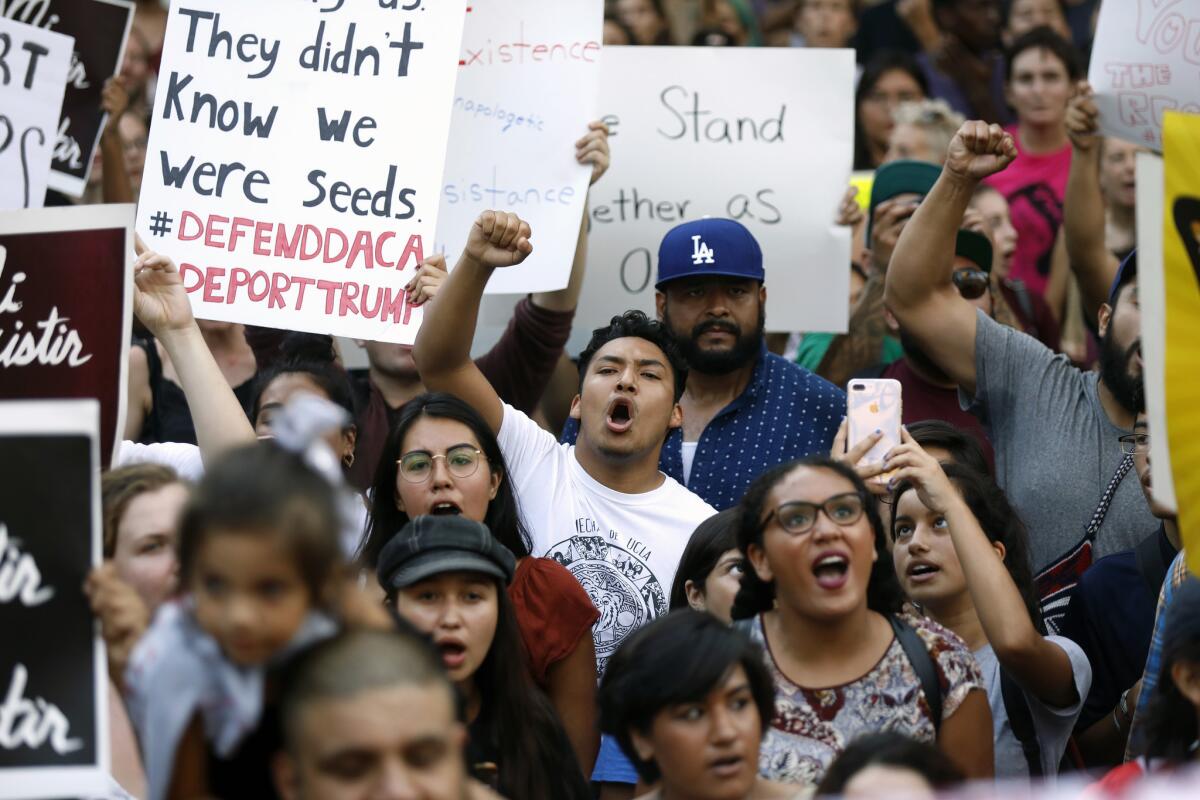 DACA supporters rally outside Los Angeles City Hall.