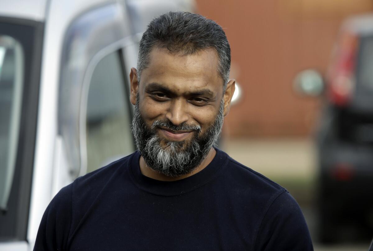 Moazzam Begg leaves Belmarsh Prison in south London after his release Wednesday. British prosecutors dropped terrorism charges against the former Guantanamo Bay detainee.