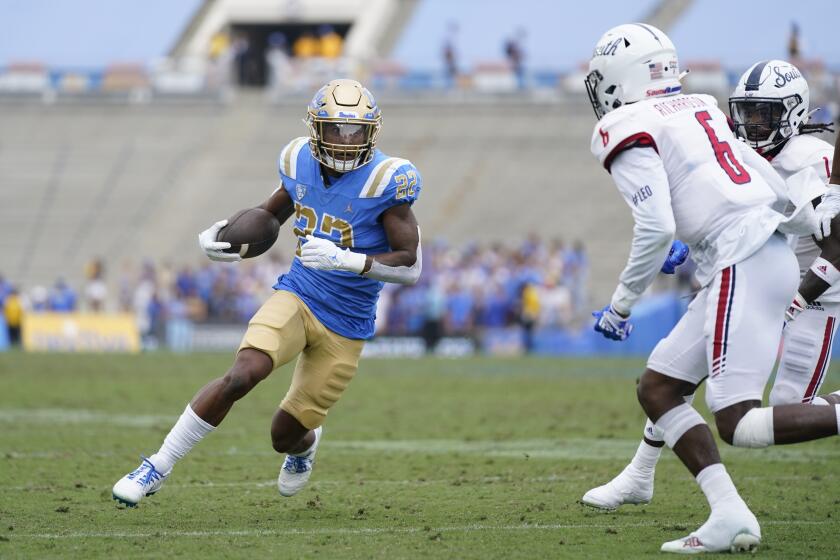 UCLA running back Keegan Jones (22) runs the ball during the first half of an NCAA college football game against South Alabama in Pasadena, Calif., Saturday, Sept. 17, 2022. (AP Photo/Ashley Landis)