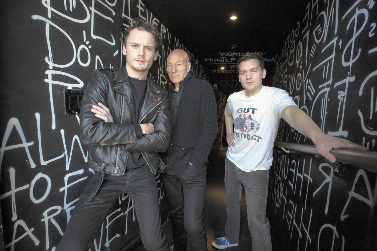 Anton Yelchin, from left, and Patrick Stewart star in director Jeremy Saulnier’s siege film “Green Room.” They are shown at the Viper Room in WeHo.