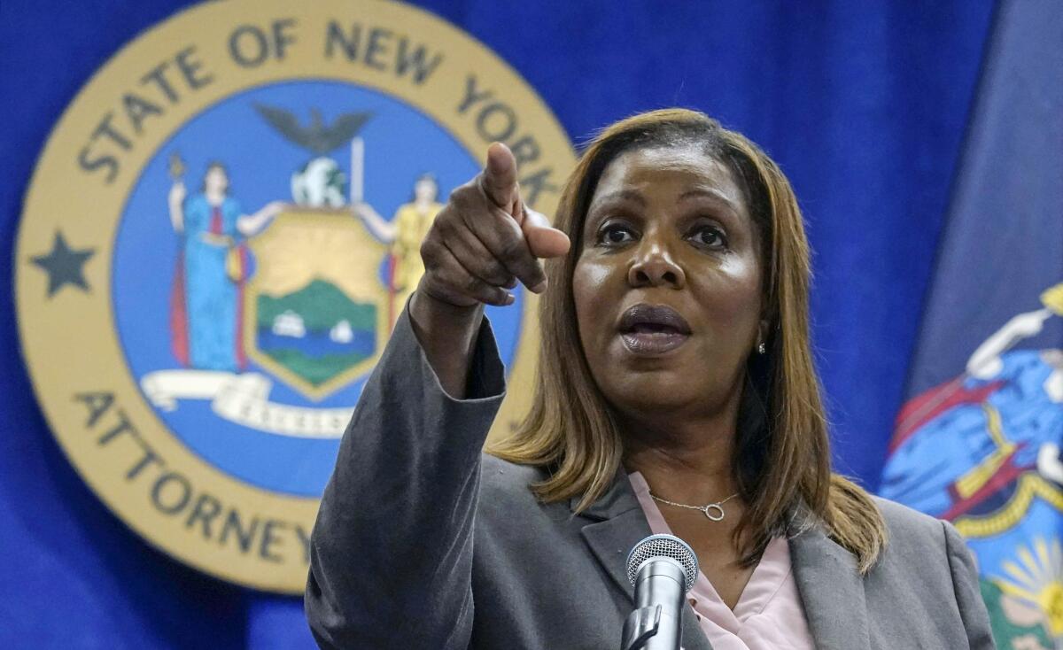 FILE - New York Attorney General Letitia James acknowledges questions from journalists at a news conference on May 21, 2021, in New York. The New York attorney general’s office said its civil investigation has uncovered evidence that former President Donald Trump's company used “fraudulent or misleading” asset valuations to get loans and tax benefits. In a court filing late Tuesday, Jan. 18, 2022, James’ office said evidence showed that the Trump Organization routinely misrepresented the value of its properties and golf clubs in financial statements. (AP Photo/Richard Drew, File)