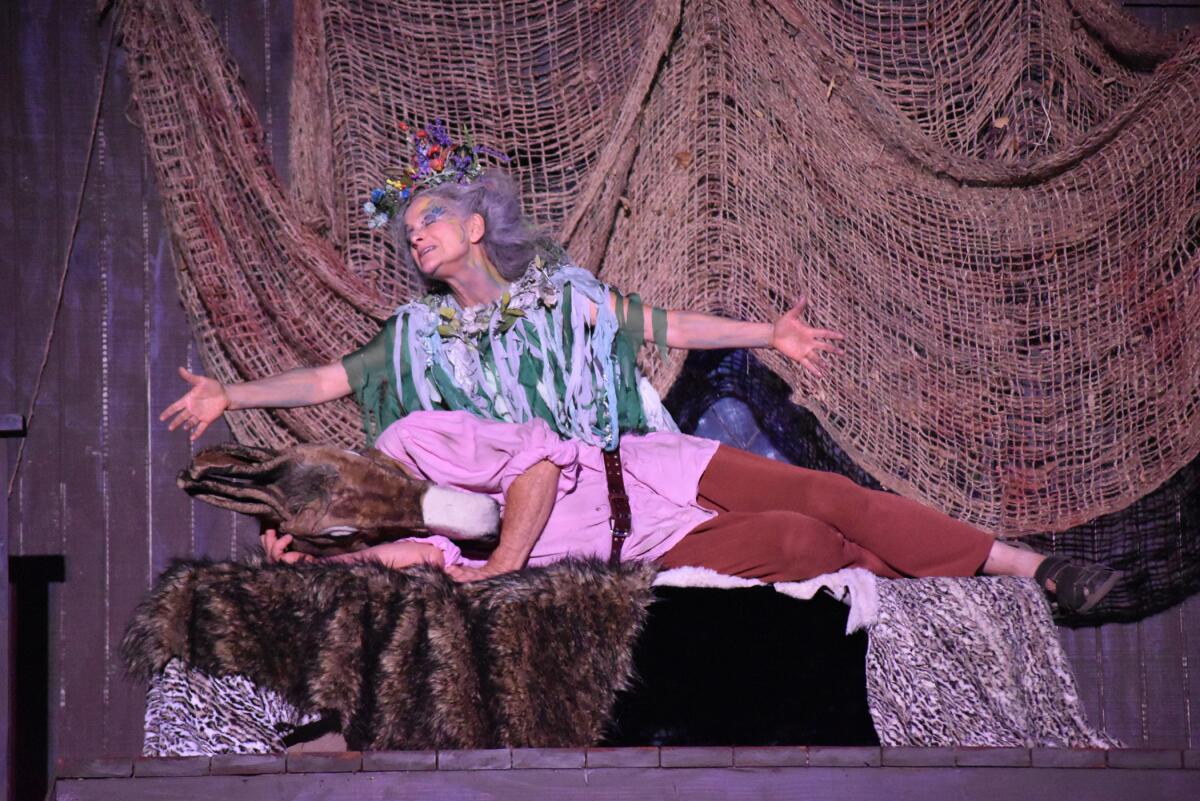 Two people perform in "A Midsummer Night's Dream."