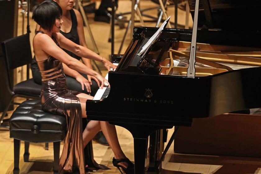 LOS ANGELES, CALIF. -- FRIDAY, MAY 26, 2017: Pianist Yuja Wang performs the Bartók piano concerto with the Los Angeles Philharmonic at the Walt Disney Concert Hall in Los Angeles, Calif., on May 26, 2017. Gustavo Dudamel now begins a two-week cycle of three Bartók piano concertos with Yuja Wang that also includes major works by Janácek (here the spectacular Glagolitic Mass) and Stravinsky (this week the composers rarely heard last major work, Requiem Canticles). (Allen J. Schaben / Los Angeles Times)