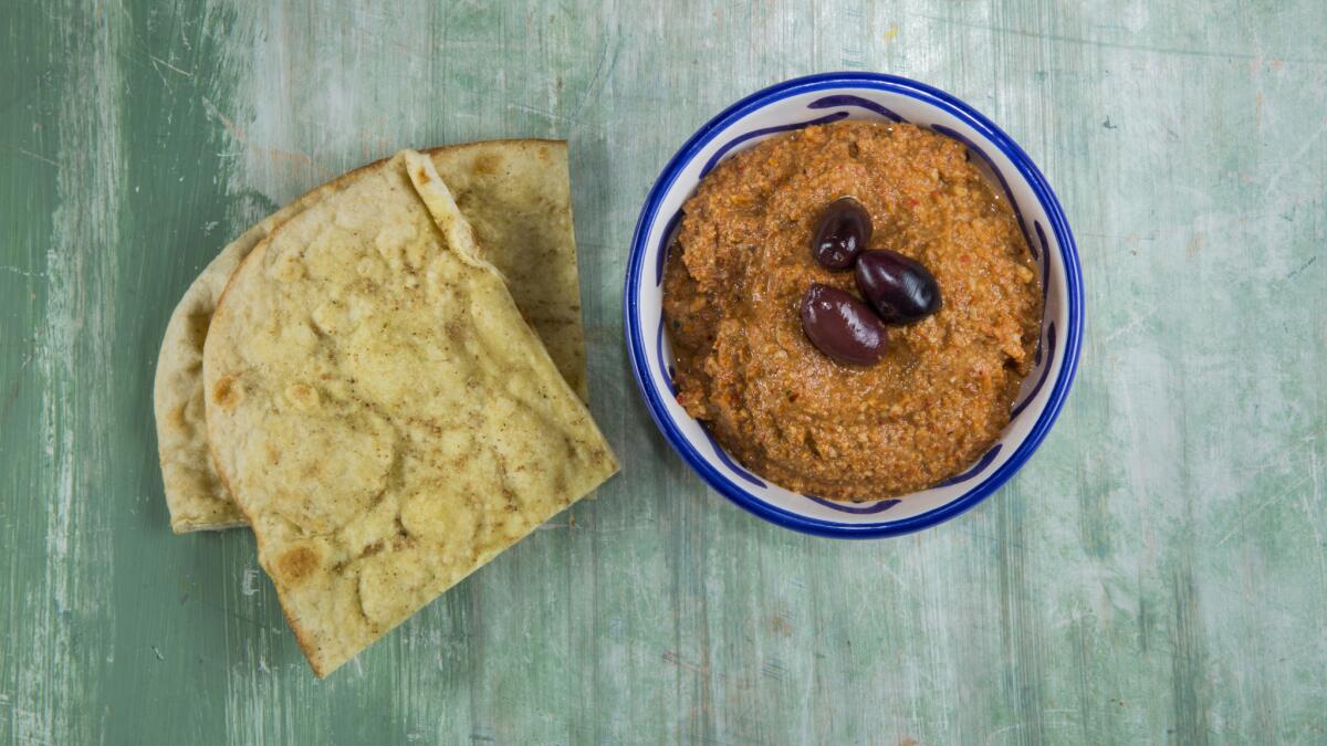 A variety of Kurdish dips, including, hesandin dip.