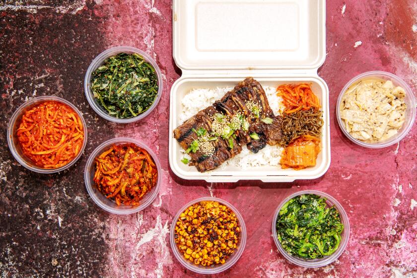 LOS ANGELES, CA - JUNE 18: LA Galbi, along with banchan from Shiku in Downtown Los Angeles on Friday, June 18, 2021 in Los Angeles, CA. (Mariah Tauger / Los Angeles Times)