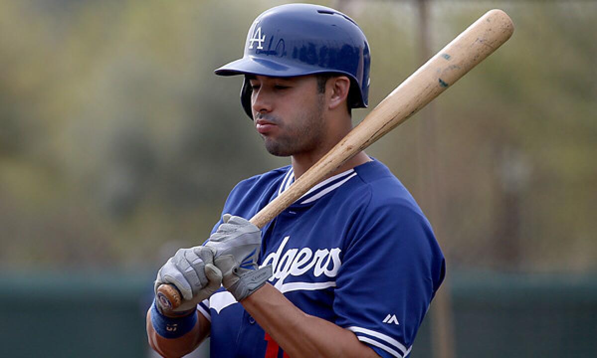 Dodgers outfielder Andre Ethier takes part in batting practice at the team's spring training facility in Glendale, Ariz., on Tuesday. Ethier says he's not going to be distracted by the Dodgers' potential future plans for him.