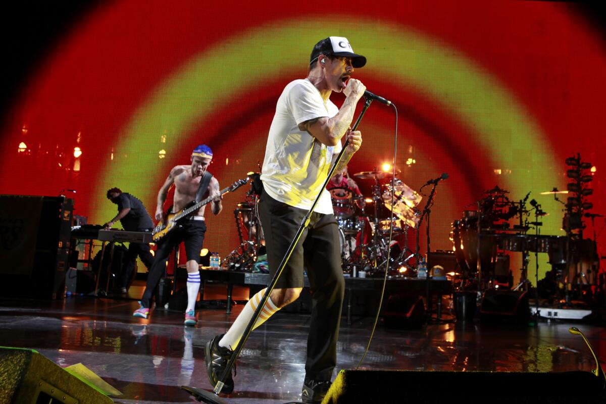 Red Hot Chili Peppers, seen performing at Staples Center in 2012, will headline KROQ's annual Weenie Roast concert on May 14.