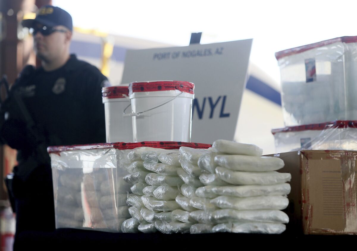 FILE - A display of the fentanyl and meth that was seized by U.S. Customs and Border Protection officers at the Nogales Port of Entry is shown during a press conference, Jan. 31, 2019, in Nogales, Ariz. On Tuesday, Feb. 7, President Joe Biden faced harsh rebukes from multiple angles as he spoke during his State of the Union address about trying to contain a drug overdose crisis driven by powerful illicit synthetic opioids like fentanyl, that has been killing more than 100,000 people a year in the U.S. (Mamta Popat/Arizona Daily Star via AP, File)