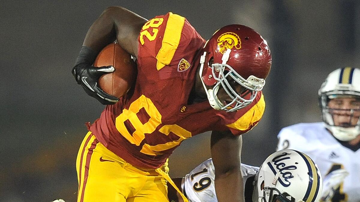 USC tight end Randall Telfer catches a pass during a win over UCLA in 2011. Telfer is eager to play a central role in the Trojans' offense this season.