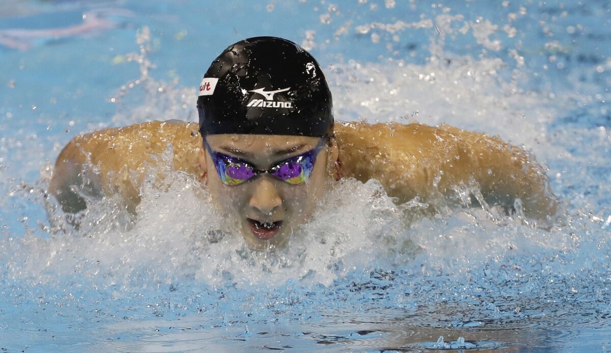 Rikako Ikee competes in the women's 100-meter butterfly final at the 2016 FINA world championships.
