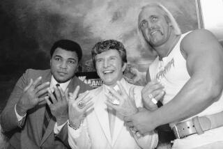 Muhammad Ali, Liberace and Hulk Hogan pose together at Madison Square Garden