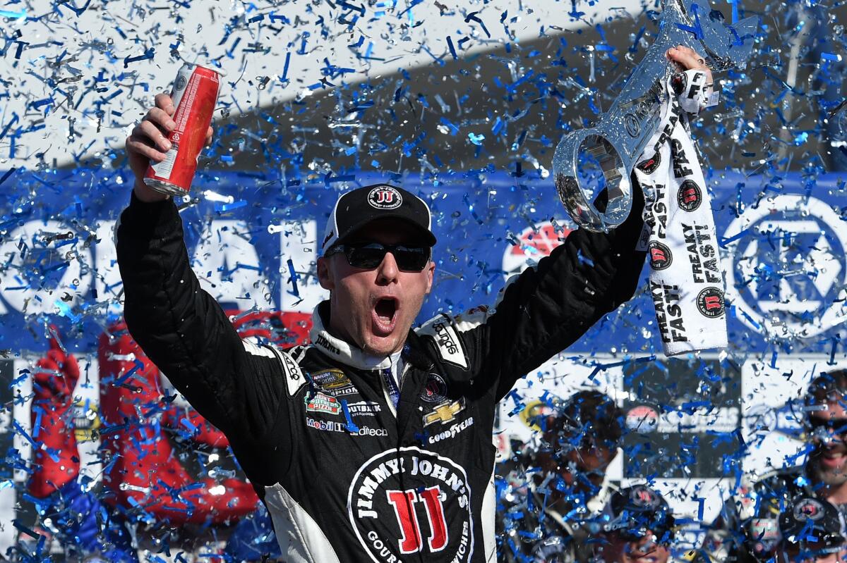 NASCAR driver Kevin Harvick celebrates after winning the Sprint Cup Kobalt 400 on Sunday in Las Vegas.