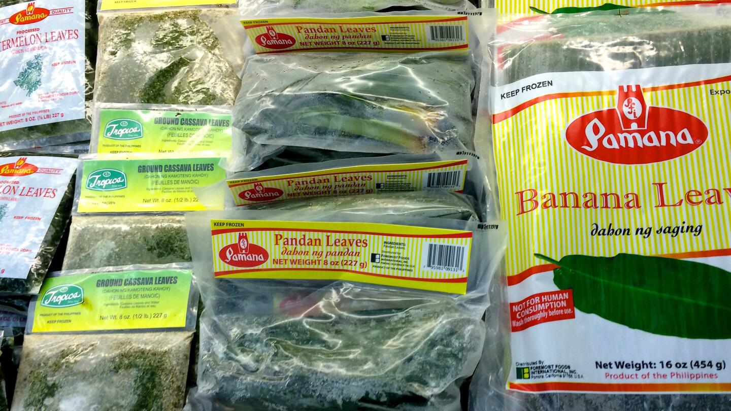 Assorted leaves in the freezer case at Seafood City.