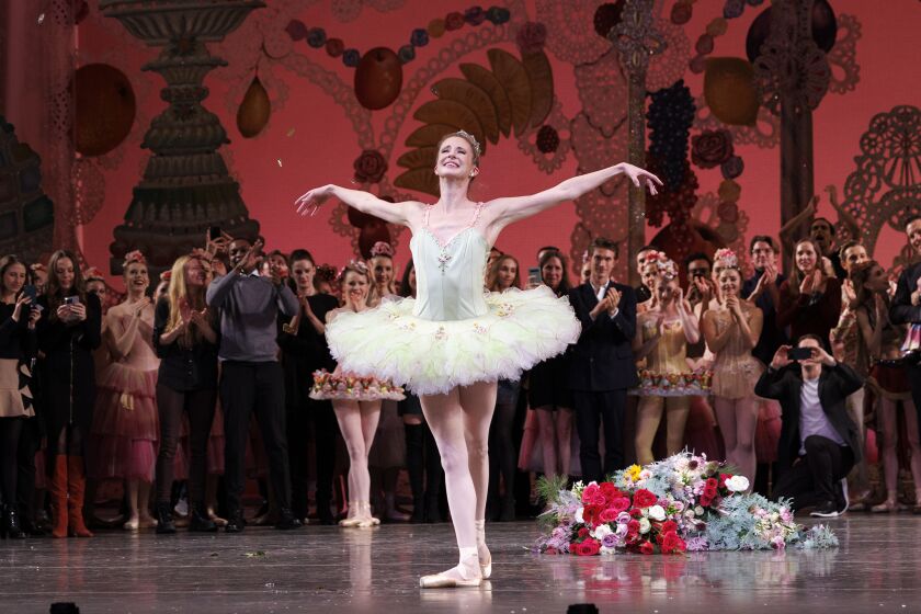 This image released by the New York City Ballet shows principal dancer Sterling Hyltin taking her final bow with New York City Ballet after performing as the Sugarplum Fairy in George Balanchine's "The Nutcracker," in New York on Dec. 4, 2022. (Erin Baiano/New York City Ballet via AP)