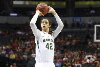 FILE - Baylor's Brittney Griner shoots a foul shot against Louisville in the second half of a regional semifinal game in the women's NCAA college basketball tournament in Oklahoma City, April 1, 2013. LSU coach Kim Mulke said Thursday, March 30, 2023, that she has not spoken to Griner since the former Baylor star was returned to the U.S. from a Russian prison, but says she is glad Griner is back and safe. (AP Photo/Sue Ogrocki, File)