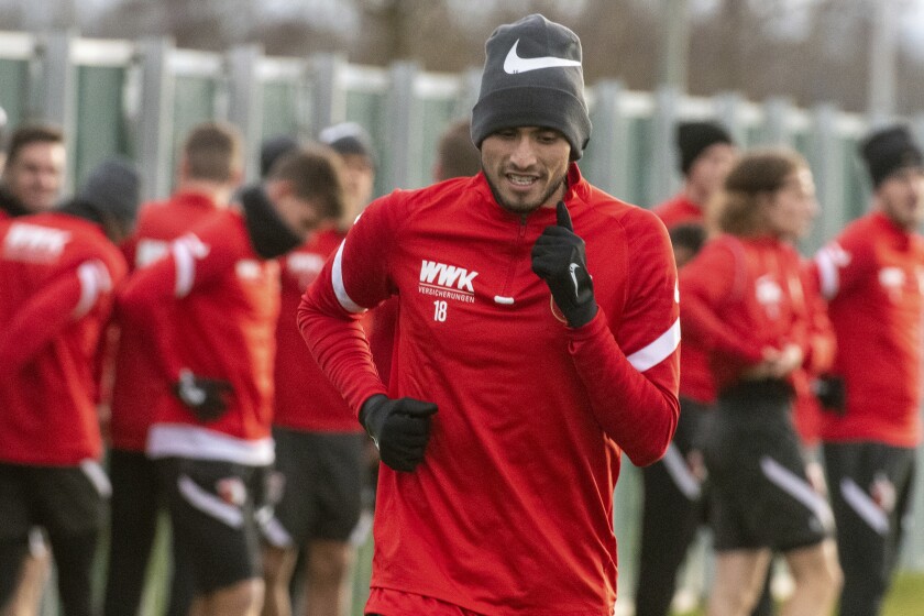 United States forward Ricardo Pepi, who has joined German Bundesliga team Augsburg from MLS club FC Dallas exercises for the first time with his new team in Augsburg, Germany, Monday, Jan. 3, 2022. (Stefan Puchner/dpa via AP)