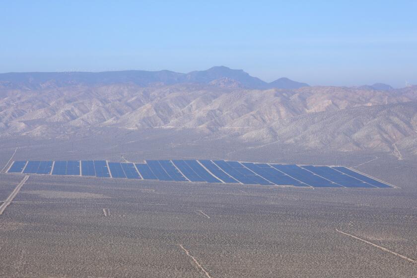 CALIFORNIA CITY, CA -- FEBRUARY 15, 2020: A solar panel farm in the Mojave Desert north of California City. The Trump administration is targeting areas of the Mojave Desert for new mining operations, alternative energy facilities as well as expansion of off-road vehicle recreation. (Myung J. Chun / Los Angeles Times)