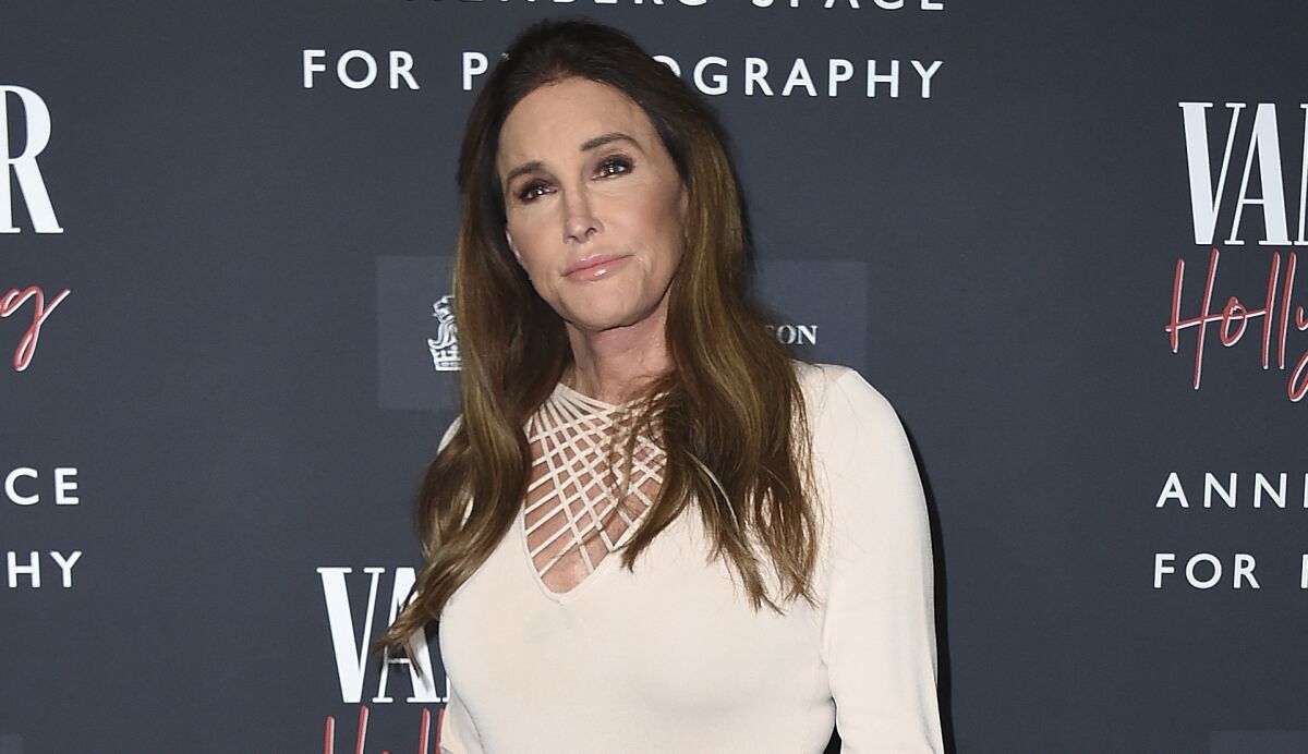 FILE - Caitlyn Jenner arrives at the Annenberg Space for Photography's Vanity Fair: Hollywood Calling Exhibit Opening on Feb. 4, 2020, in Los Angeles. Jenner's reflections toward winning an Olympic gold medal, the famous "Malice at the Palace" brawl and boxer Christy Martin's fight for her life outside the ring are some of the most pivotal sports moments highlighted in a new Netflix docuseries airing next month. The streaming service giant announced Tuesday, July 20, 2021, that the series "UNTOLD" will premiere Aug. 10. (Photo by Jordan Strauss/Invision/AP, File)