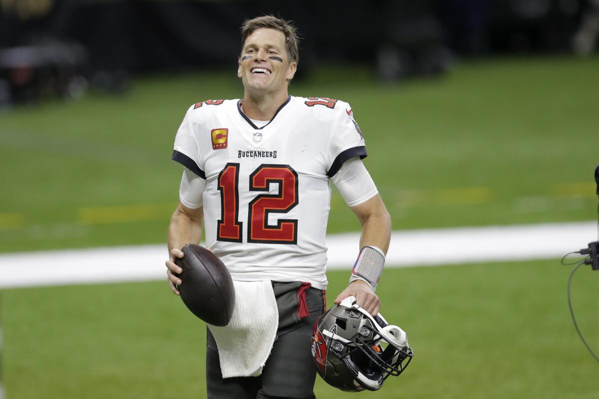 Tom Brady smiles after the Tampa Bay Buccaneers' victory over the New Orleans Saints.