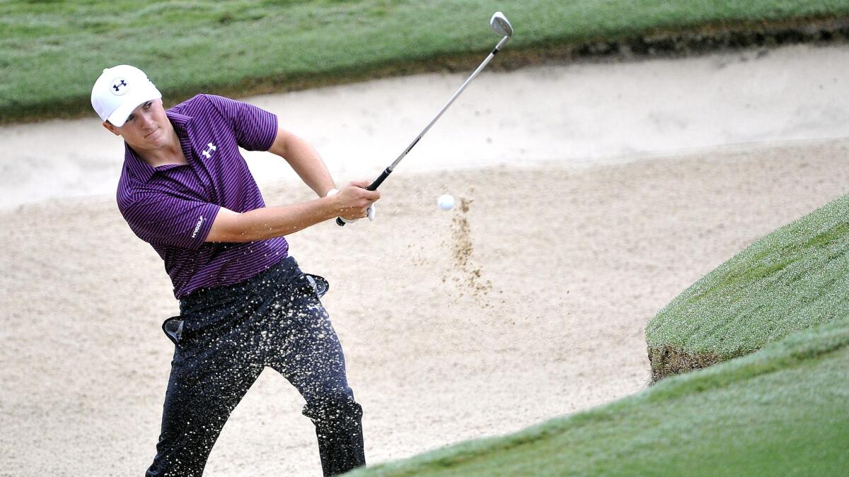 Jordan Spieth hits from a greenside bunker at No. 17 during the second round of the Tour Championship on Friday at East Lake Club in Atlanta.