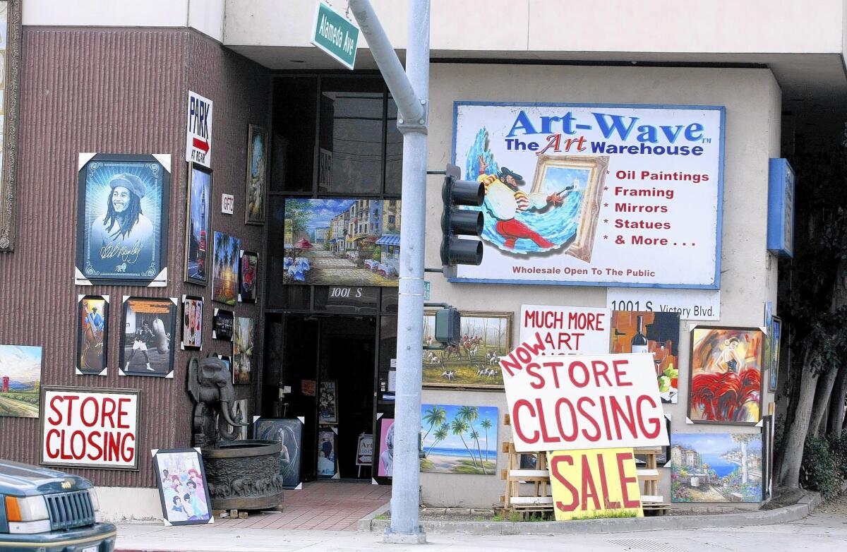Art Wave, an art warehouse, has closing soon signs outside the store on Alameda and Victory Boulevard in Burbank on Tuesday, March 11, 2014.