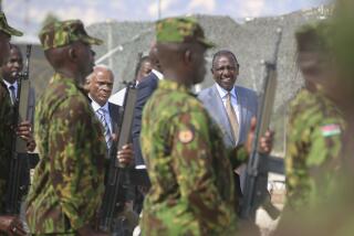 Kenya's President William Ruto, right, and Transition Council President Edgard Leblanc, arrive to the Kenyan base in Port-au-Prince, Haiti, Saturday, Sept. 21, 2024. (AP Photo/Odelyn Joseph)