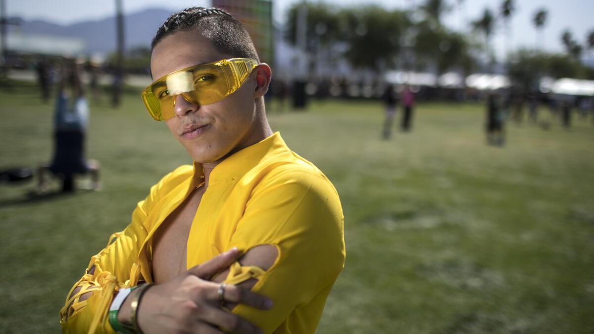 Ivan Gaxeola, 21, of Sinaloa, Mexico, lights up the crowd.