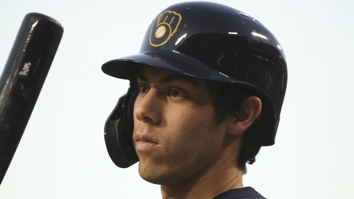 Milwaukee Brewers' Christian Yelich waits to bat during the first inning of Game 4 of the National League Championship Series.