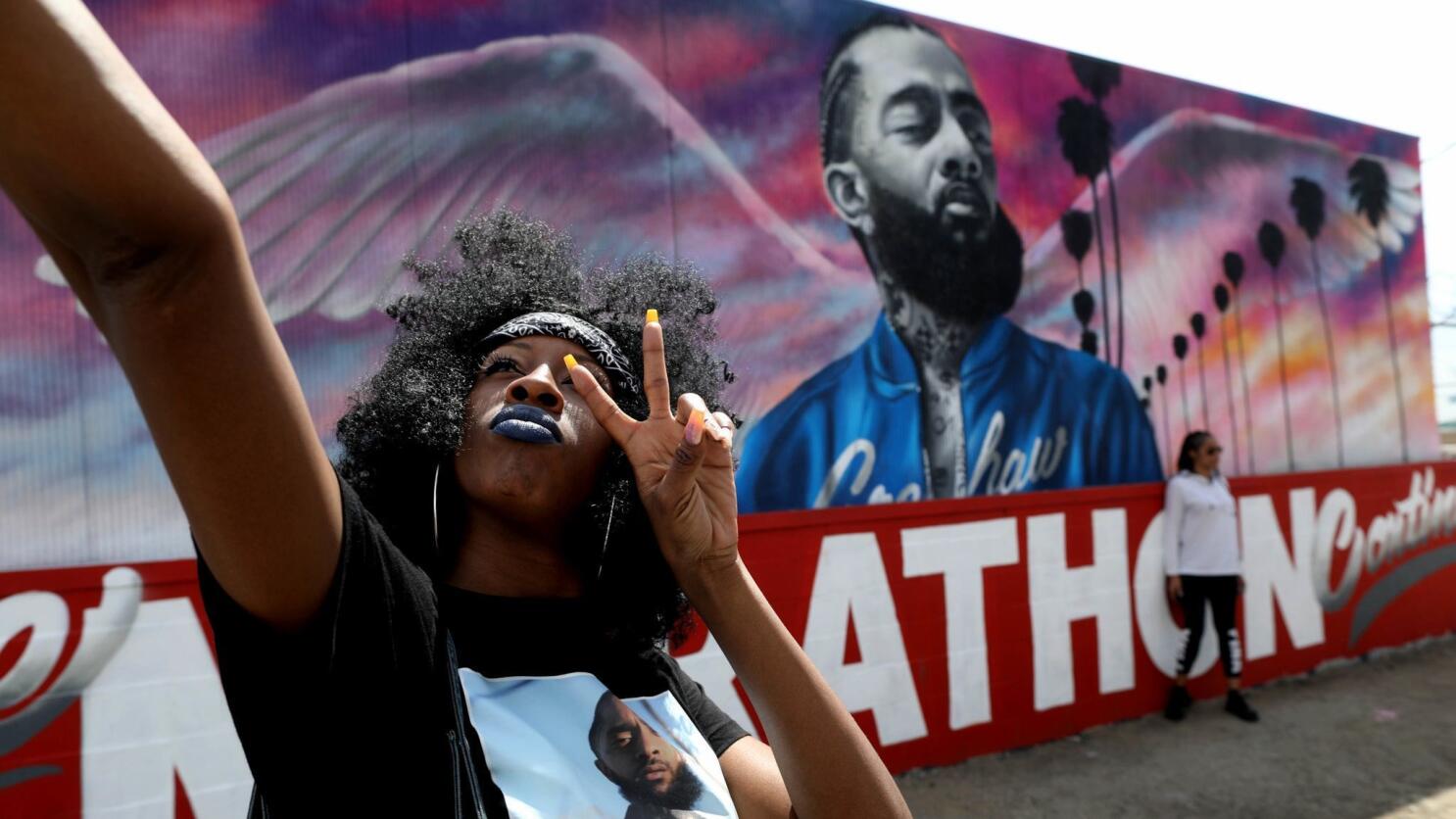 Los Angeles, California, USA 27th May 2019 A general view of atmosphere of  painting of Nipsey Hussle at We Rise LA on May 27, 2019 at 1262 Palmetto  Street in Los Angeles