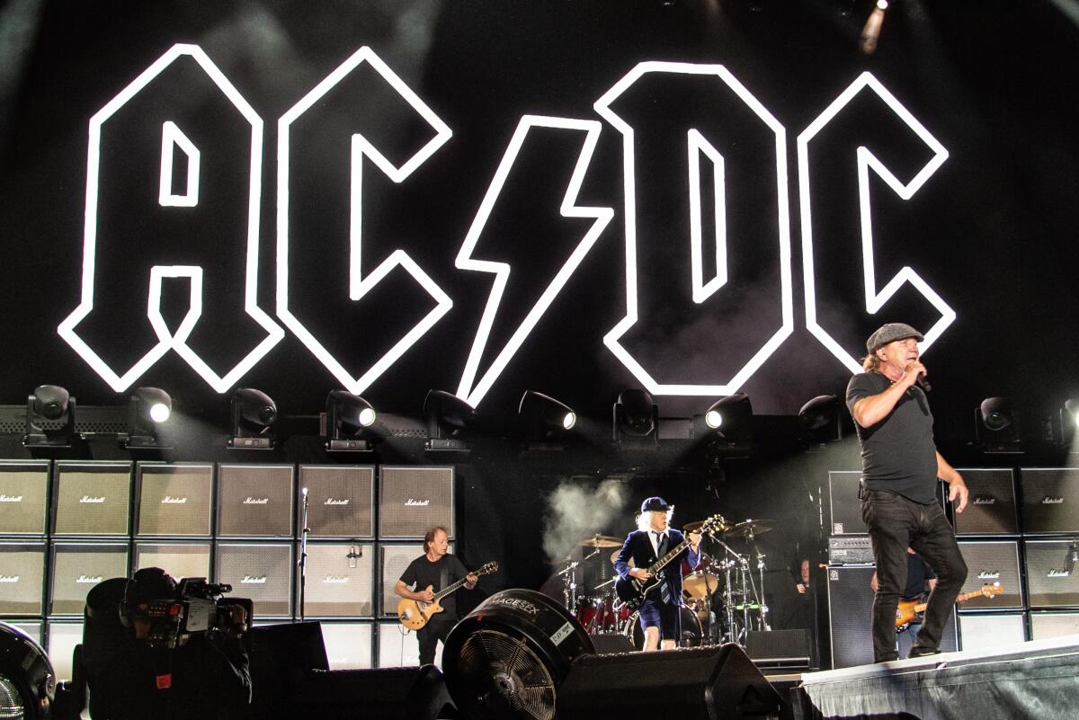 AC/DC performs onstage