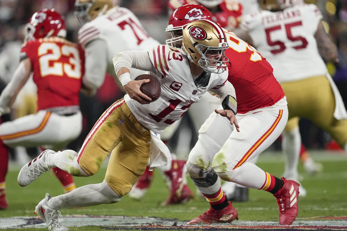 San Francisco 49ers quarterback Brock Purdy scrambles against the Kansas City Chiefs.