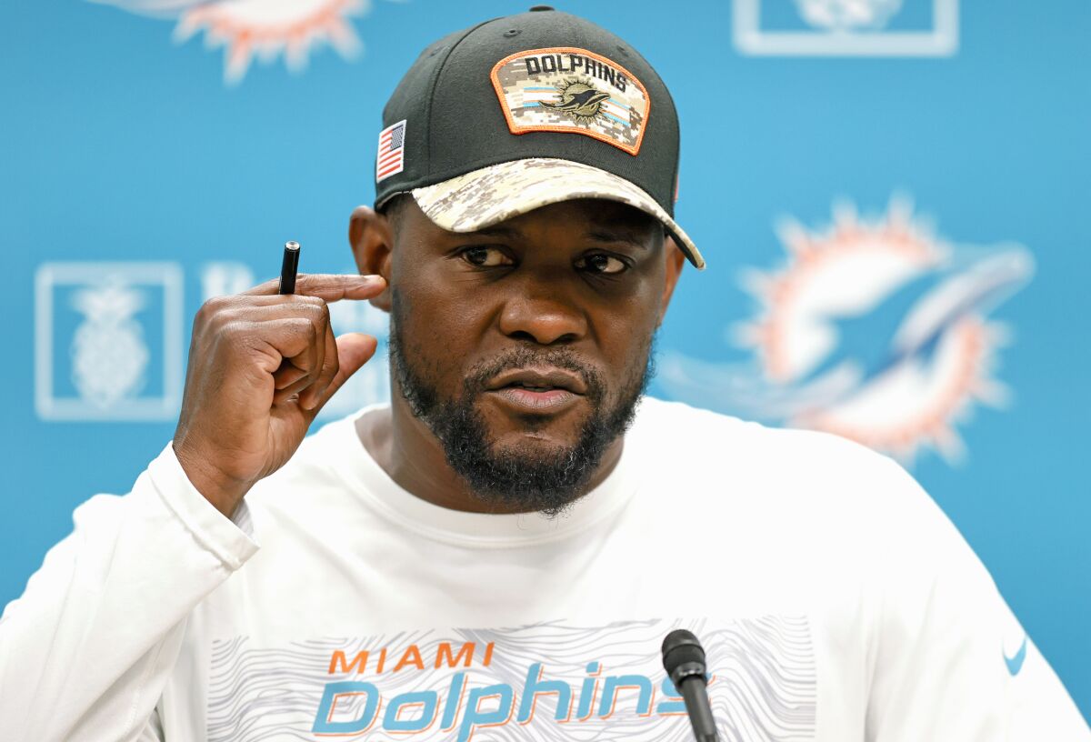 Miami Dolphins head coach Brian Flores talks to the media before practice at Baptist Health Training Complex in Hard Rock Stadium on Wednesday, Dec. 15, 2021 in Miami Gardens, Fla., in preparation for their game against the New York Jets on Sunday. (David Santiago /Miami Herald via AP)