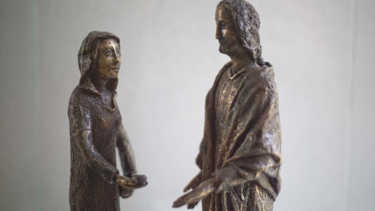 A sculpture of Mary Magdalene and Jesus on display at the Magdala center, on the Sea of Galilee in Migdal, Israel.