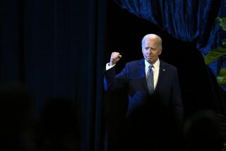 President Joe Biden walks on stage to speak during the NAACP national convention Tuesday, July 16, 2024, in Las Vegas. (AP Photo/David Becker)