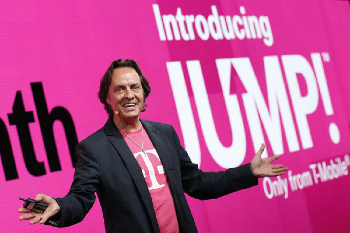 T-Mobile CEO John Legere introduces "Jump," the company's new device upgrade program. Now T-Mobile is giving AT&T an earful for its similar "Next" plan.