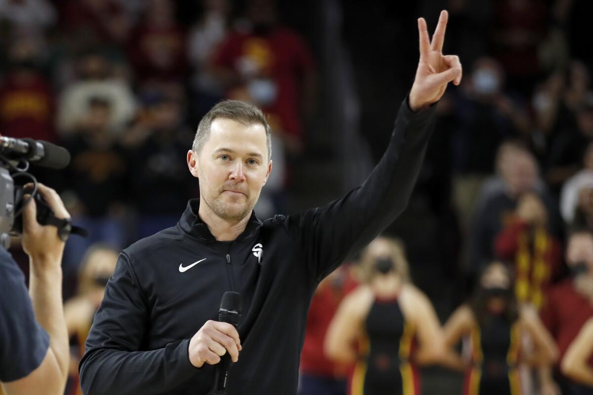 USC football coach Lincoln Riley attends a men's basketball game.