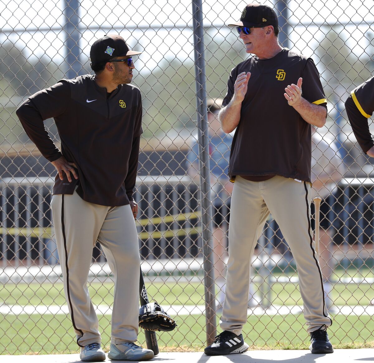 Padres center fielder Trent Grisham, left, and manager Bob Melvin 