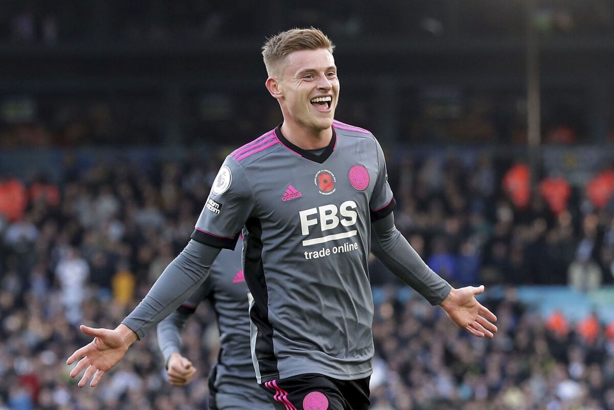 Leicester City's Harvey Barnes celebrates scoring during the English Premier League soccer match between Leeds and Leicester Citt at Elland Road, Leeds, England, Sunday Nov. 7, 2021. (Richard Sellers/PA via AP)