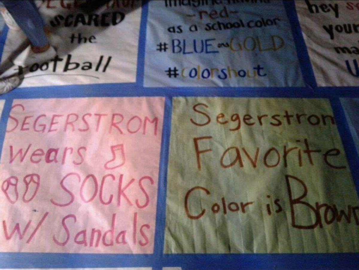 Student-made signs  at the Marina-Segerstrom football game 