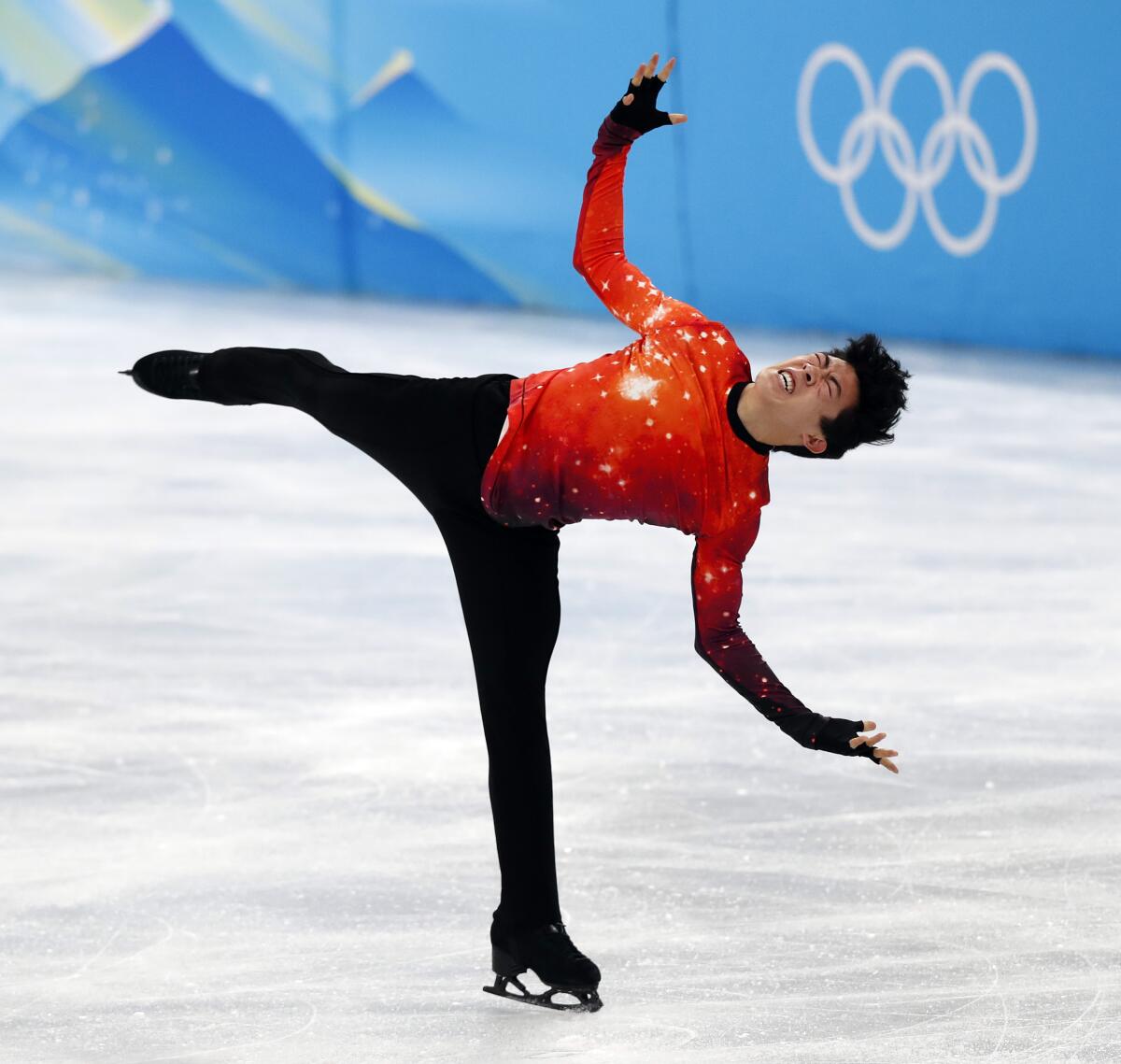 Nathan Chen performs during his free skate program on his way to winning individual gold.