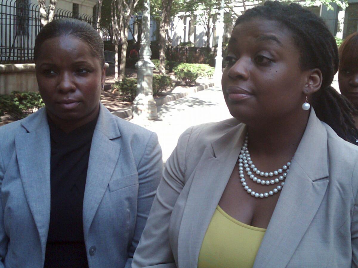 Brandi Johnson, left, and her lawyer, Marjorie M. Sharpe, leave federal court in New York after a civil jury awarded $30,000 in punitive damages in addition to the $250,000 in compensatory damages that had been awarded last week.