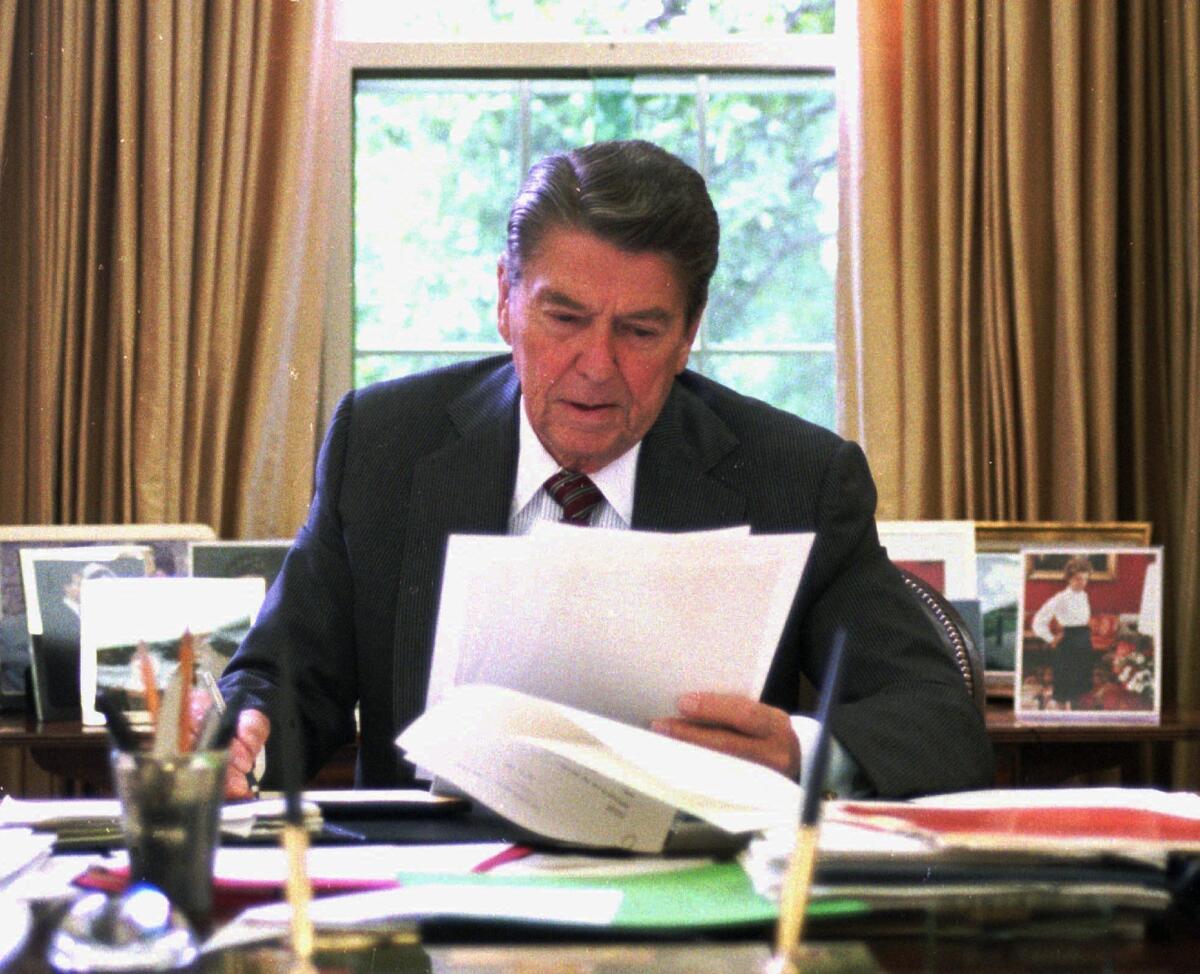 Ronald Reagan in the Oval Office in 1987.