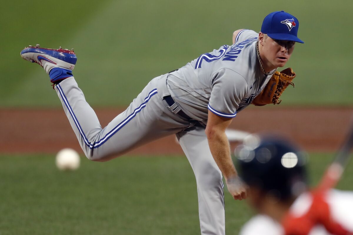Toronto Blue Jays' Chase Anderson pitches during the first inning of a baseball game against the Boston Red Sox, Saturday, Aug. 8, 2020, in Boston. (AP Photo/Michael Dwyer)