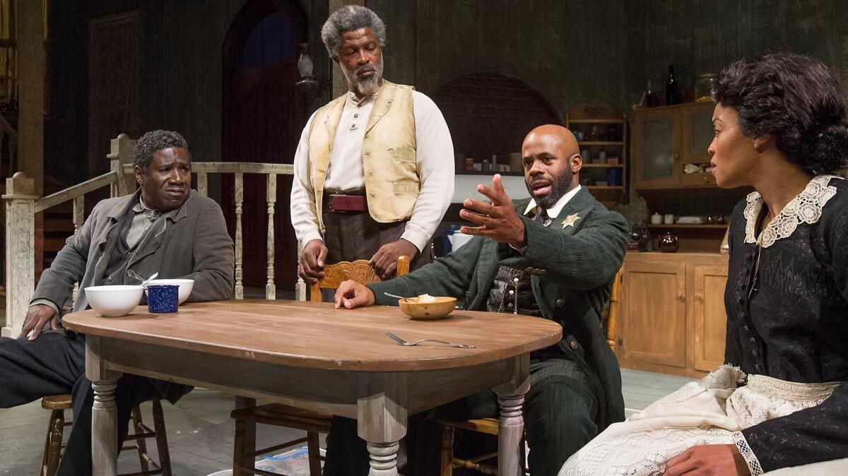 Cast members, from left to right, Cleavant Derricks, Matt Ordua, Arnell Powell and Shinelle Azoroh rehearse "Gem of the Ocean" at South Coast Repertory in Costa Mesa.