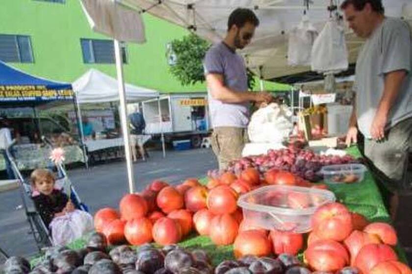 Robert Todd of Rancho Padre, from Exeter, is a former schoolteacher who sells organic peaches, nectarines and plums at the Venice farmers market.