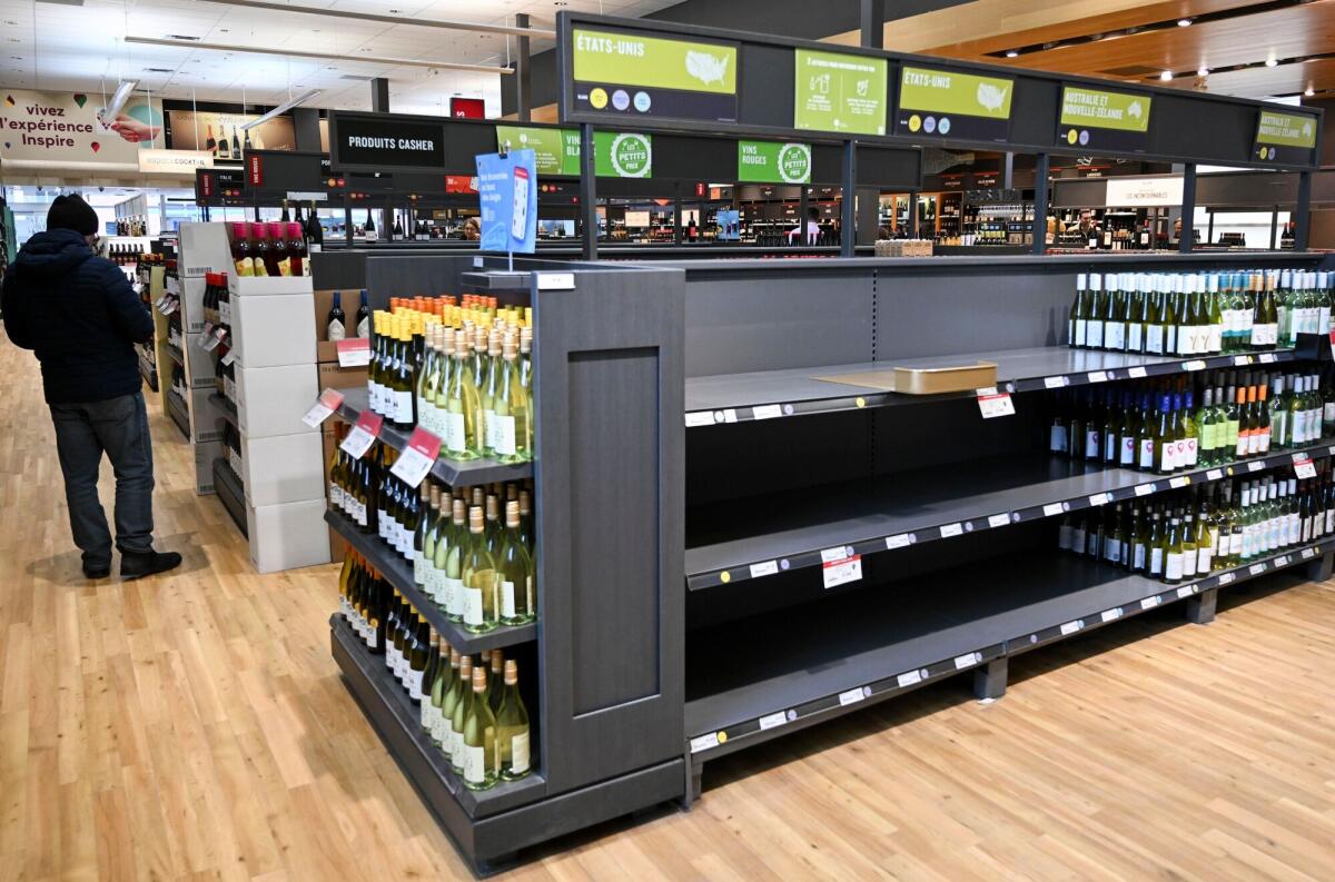 Empty space on shelves where American-made wine had been at a store in Montreal.