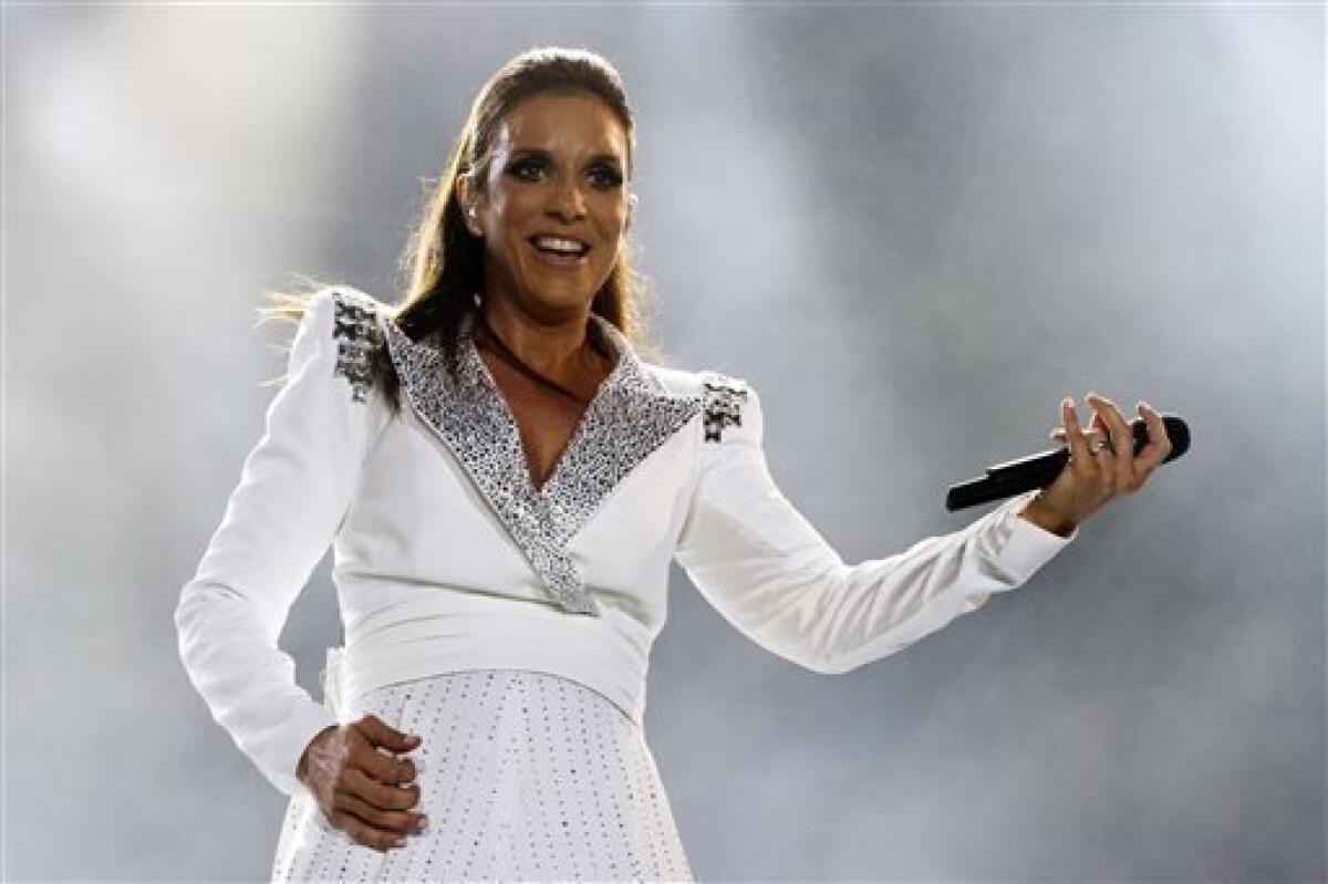 FILE - This Sept. 30, 2011 file photo shows singer Ivete Sangalo performing during the Rock in Rio music festival in Rio de Janeiro, Brazil. Sangalo will celebrate her 20-year career with a five city U.S. tour that takes her to the West Coast for the first time. (AP Photo/Felipe Dana, File)